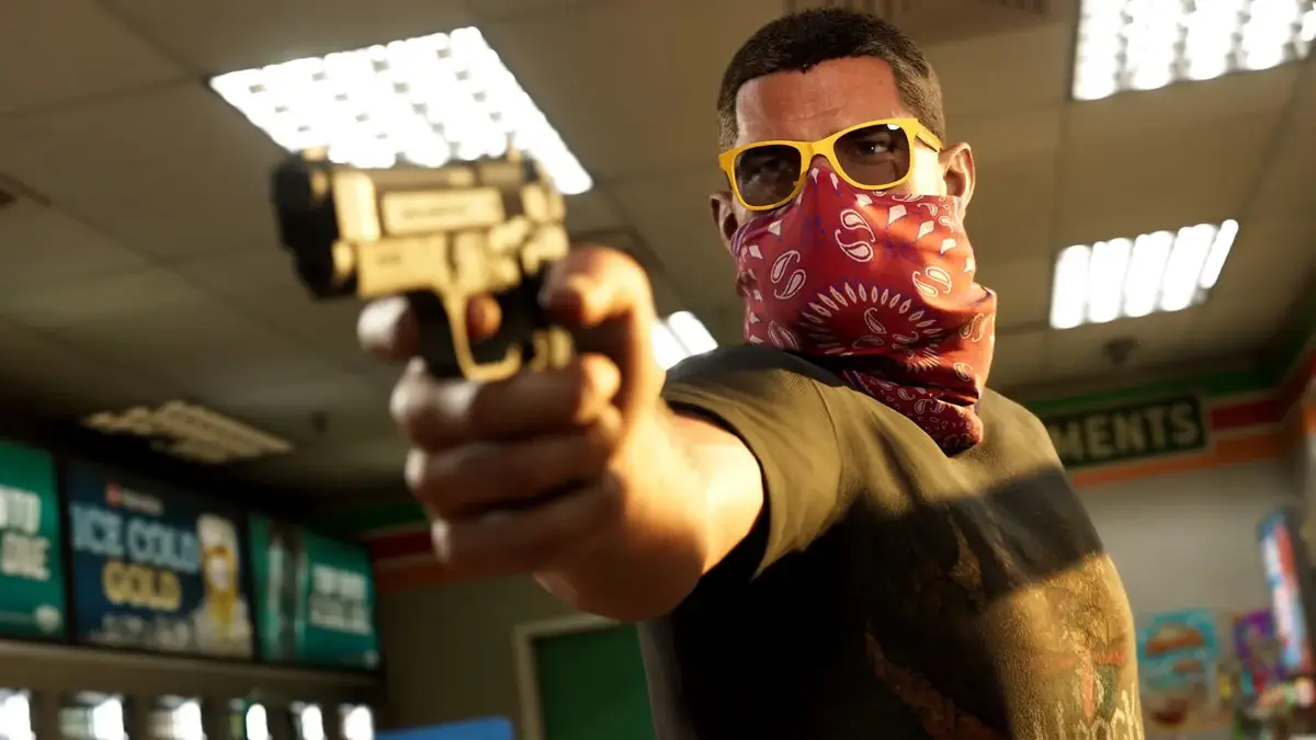 Official GTA VI scene of a masked figure raising a pistol inside a store